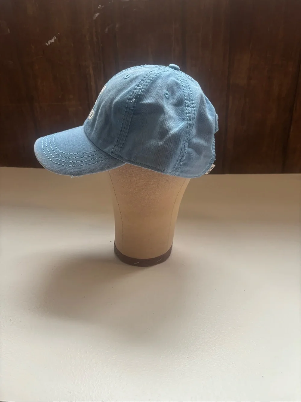 light blue Life is Good Sunwashed Chill Cap white embroidered